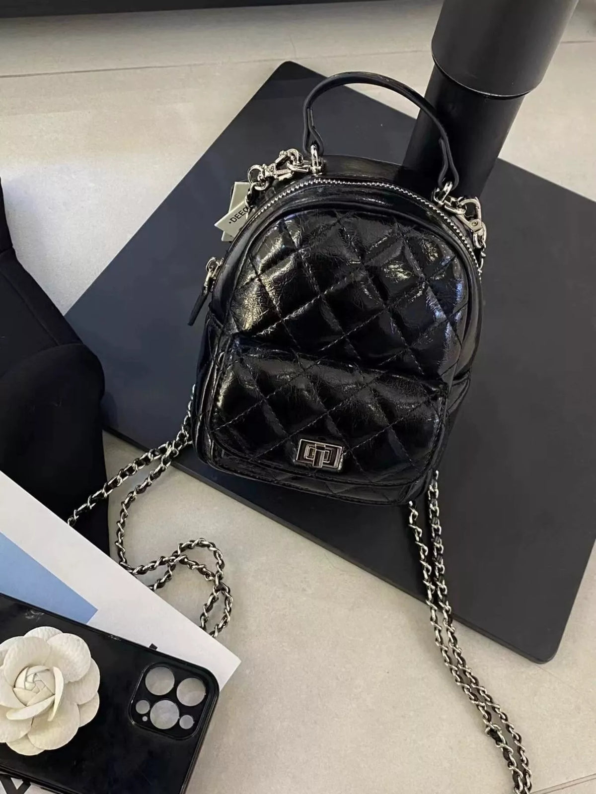 Quilted Metallic and Patent Mini Backpack Bag with Chain Strap in Black