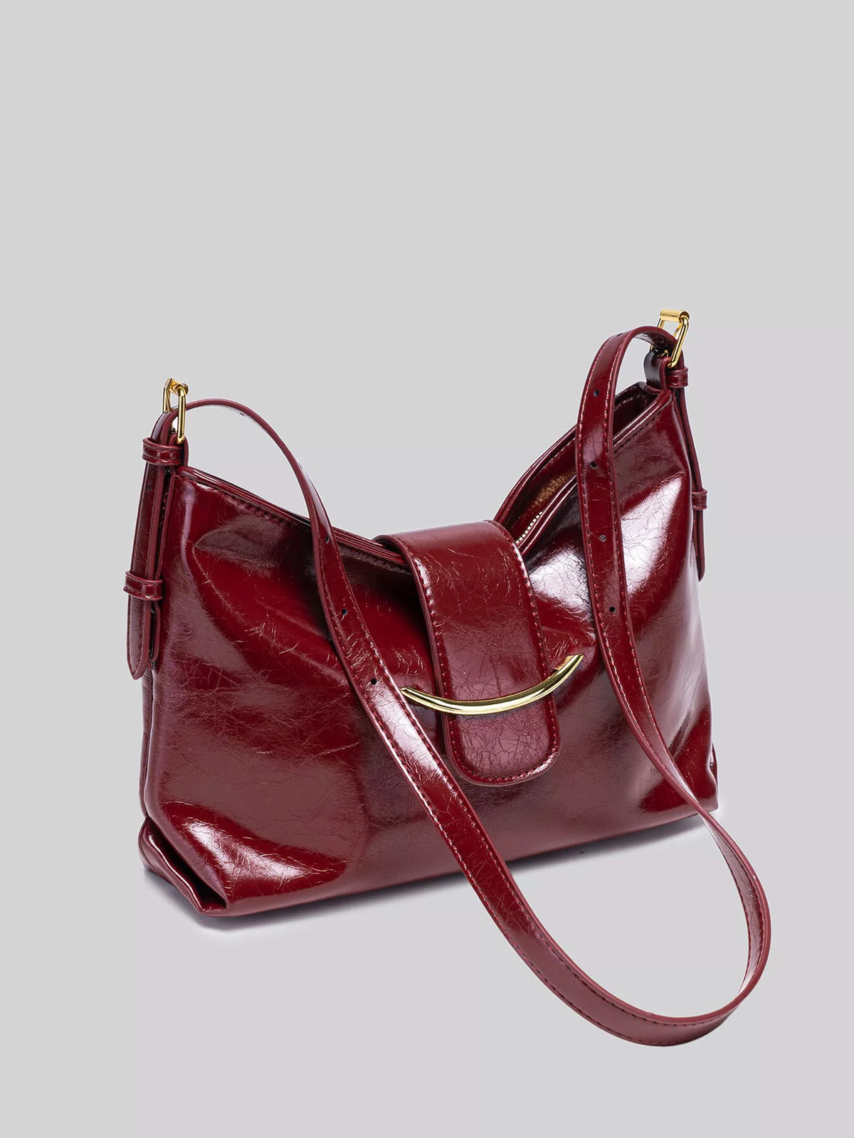 Elegant Glossy Patent Leather Shoulder Bag with Crescent Gold Accent in Wine Red, view 5