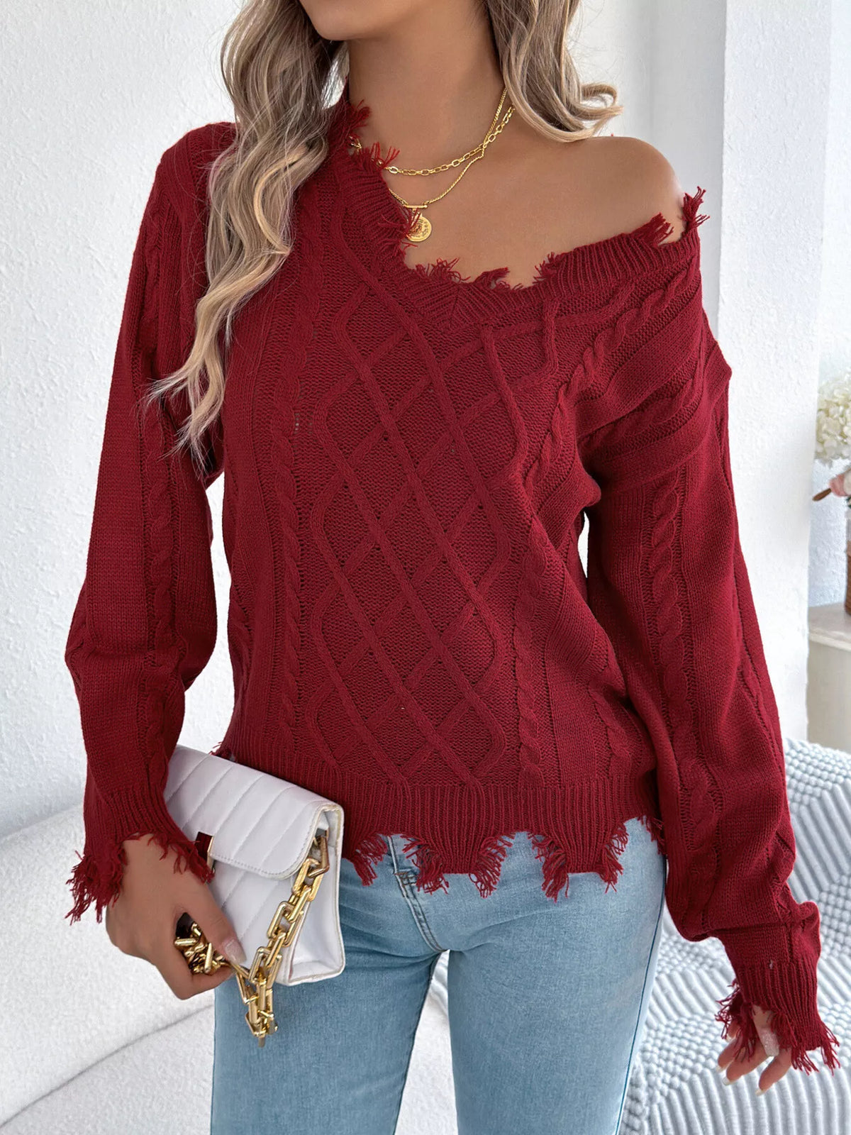V-Neck Distressed Hem Cable Knit Sweater