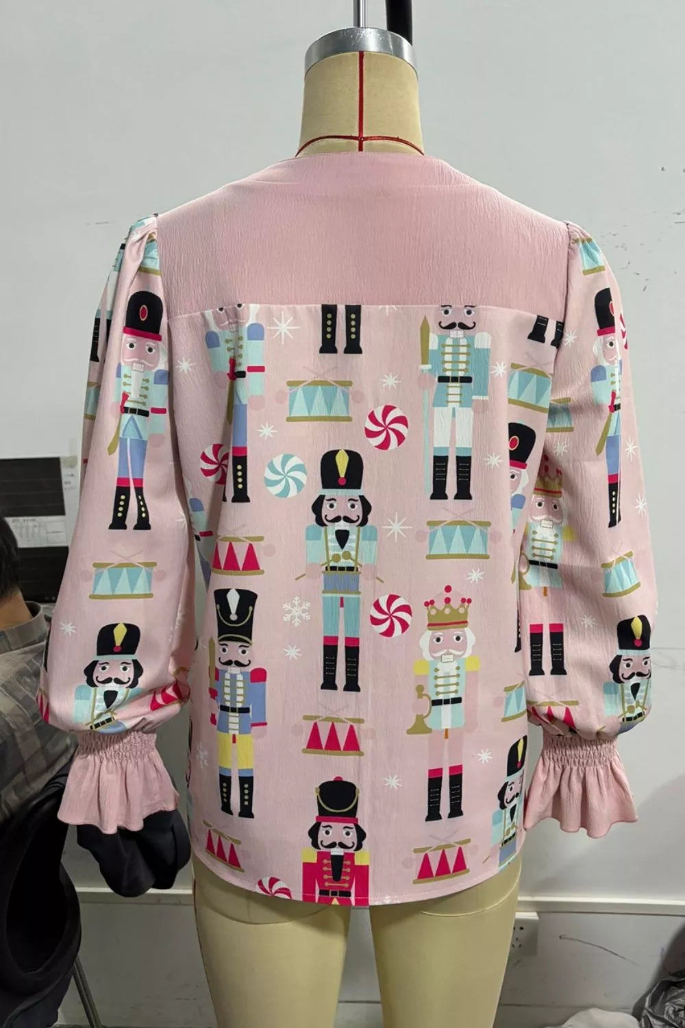 Nutcracker Print Notched Flounce Sleeve Blouse in Blush Pink, view 7