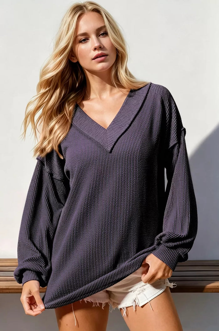 Double Take Exposed Seam Ribbed Textured V-Neck Long Sleeve T-Shirt in Purple