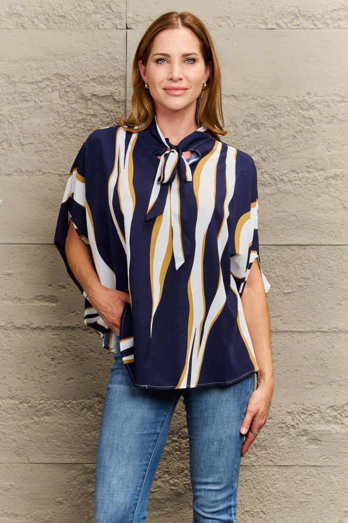 Perfee Tie Neck Printed Slit Sleeve Blouse in Multicolor