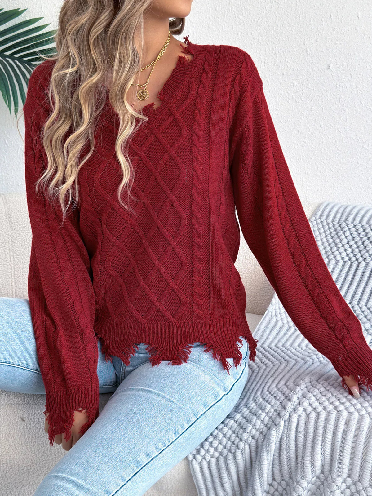 V-Neck Distressed Hem Cable Knit Sweater