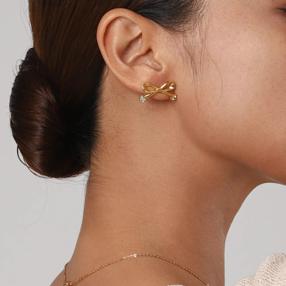 Stainless Steel Inlaid Zircon Bow Earrings in Gold