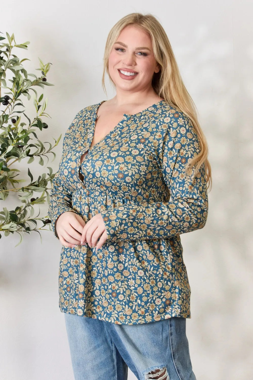 Heimish Full Size Floral Half Button Long Sleeve Blouse - Lilixa.store