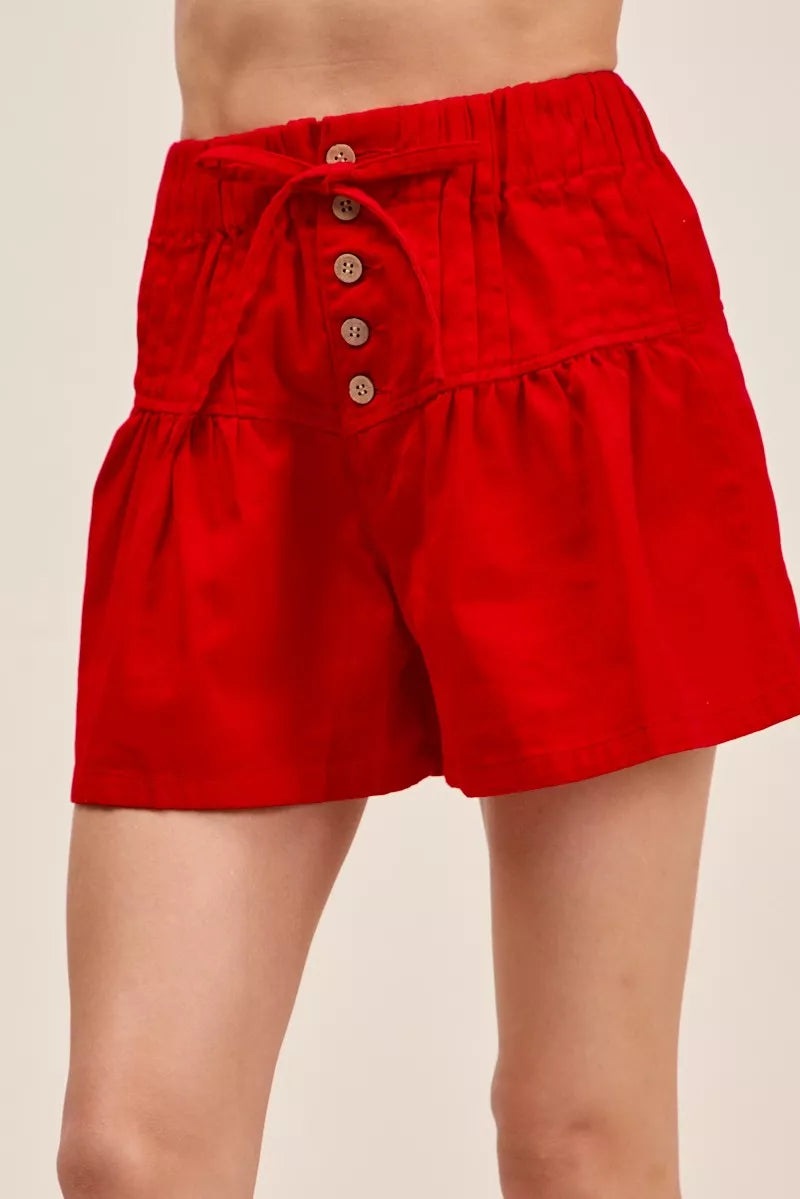 SO ME Solid Twill Denim Pintucked Buttoned Shorts With Waist Tie in Red
