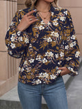 Perfee Floral Notched Balloon Sleeve Blouse - Lilixa.store