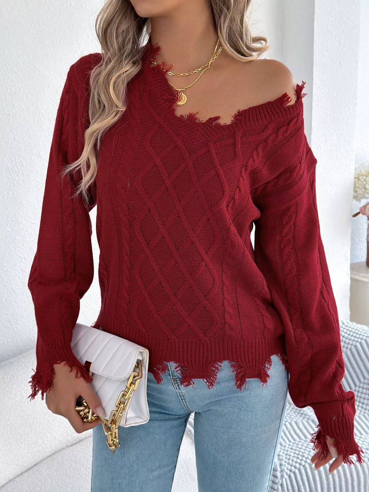 V-Neck Distressed Hem Cable Knit Sweater