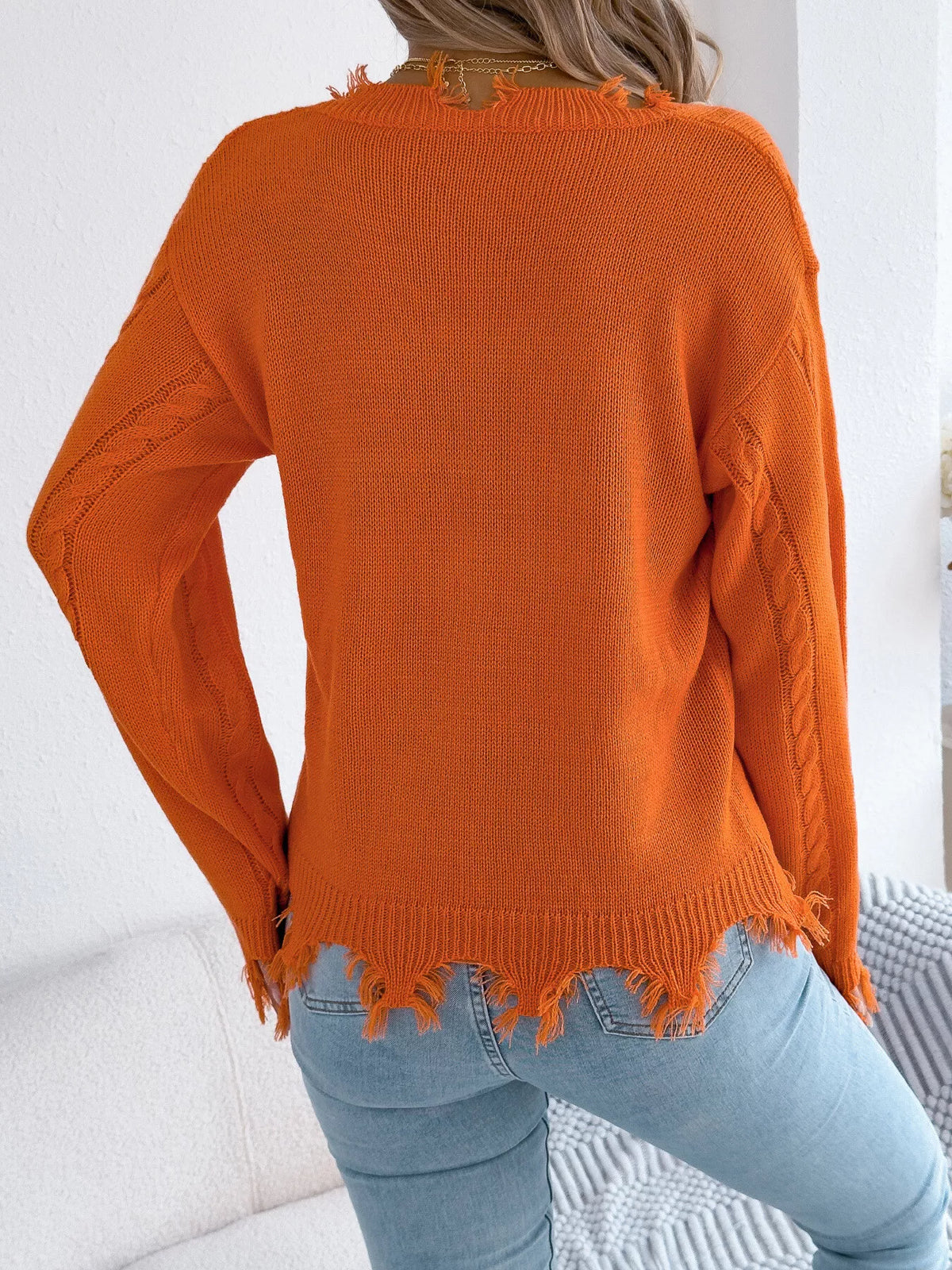 V-Neck Distressed Hem Cable Knit Sweater