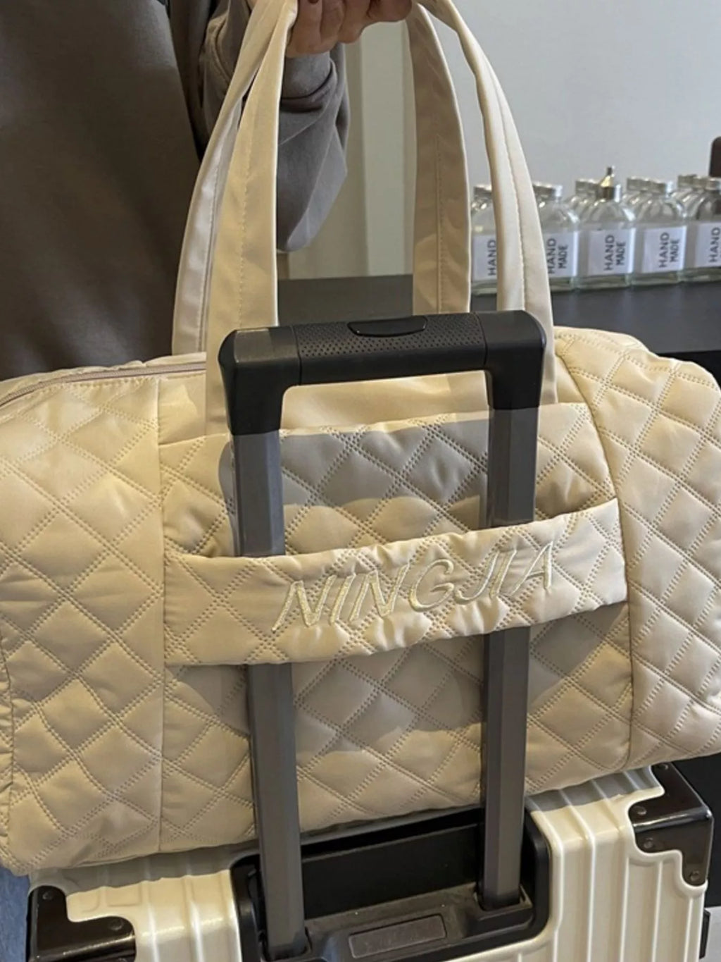 Quilted Duffel Bag with Adjustable Strap in Off-white, view 7