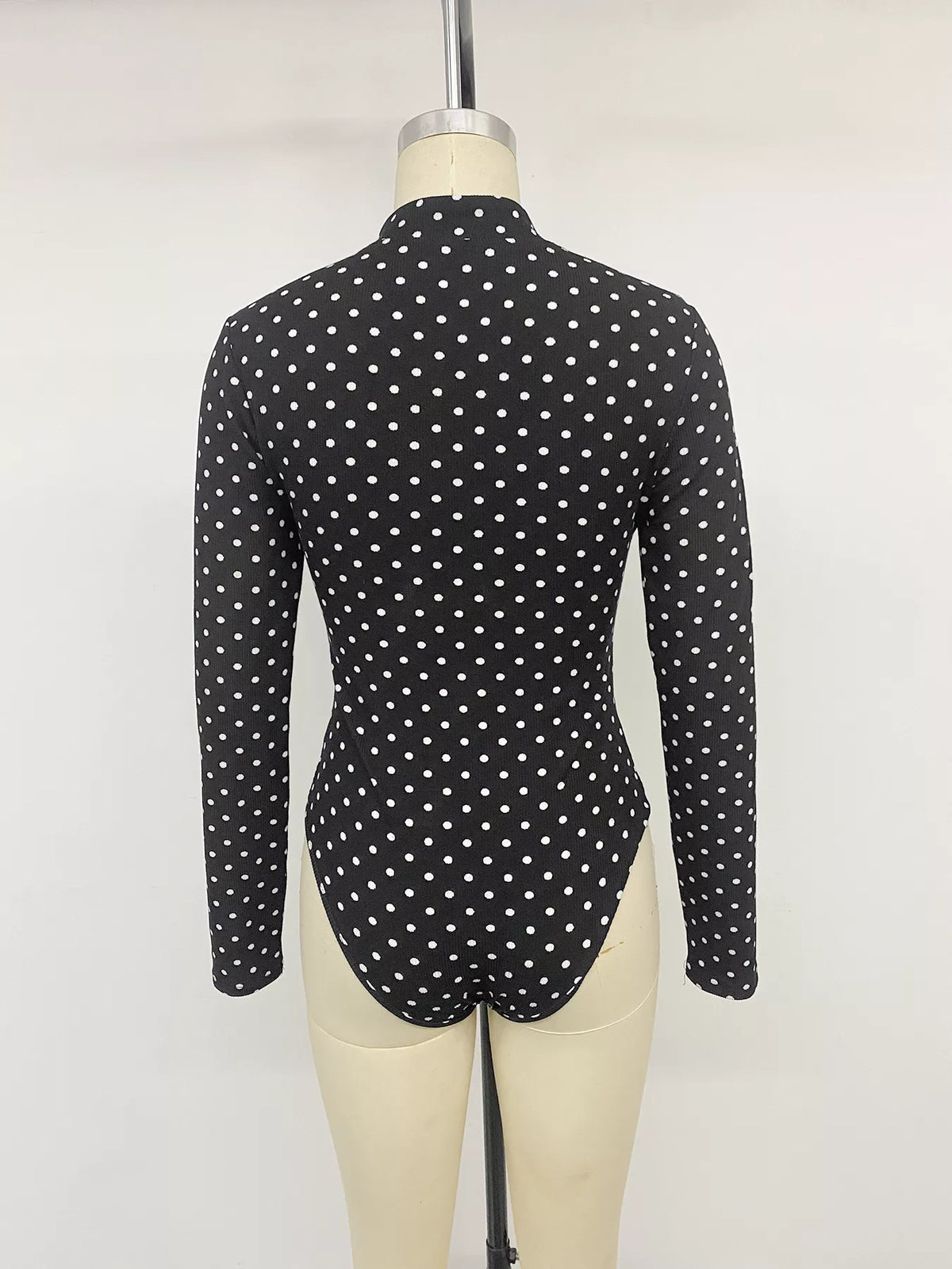 Polka Dot Cutout Long Sleeve Bodysuit