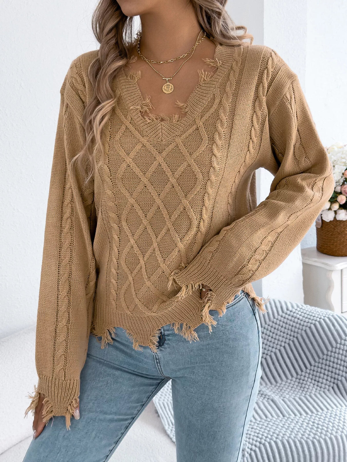 V-Neck Distressed Hem Cable Knit Sweater