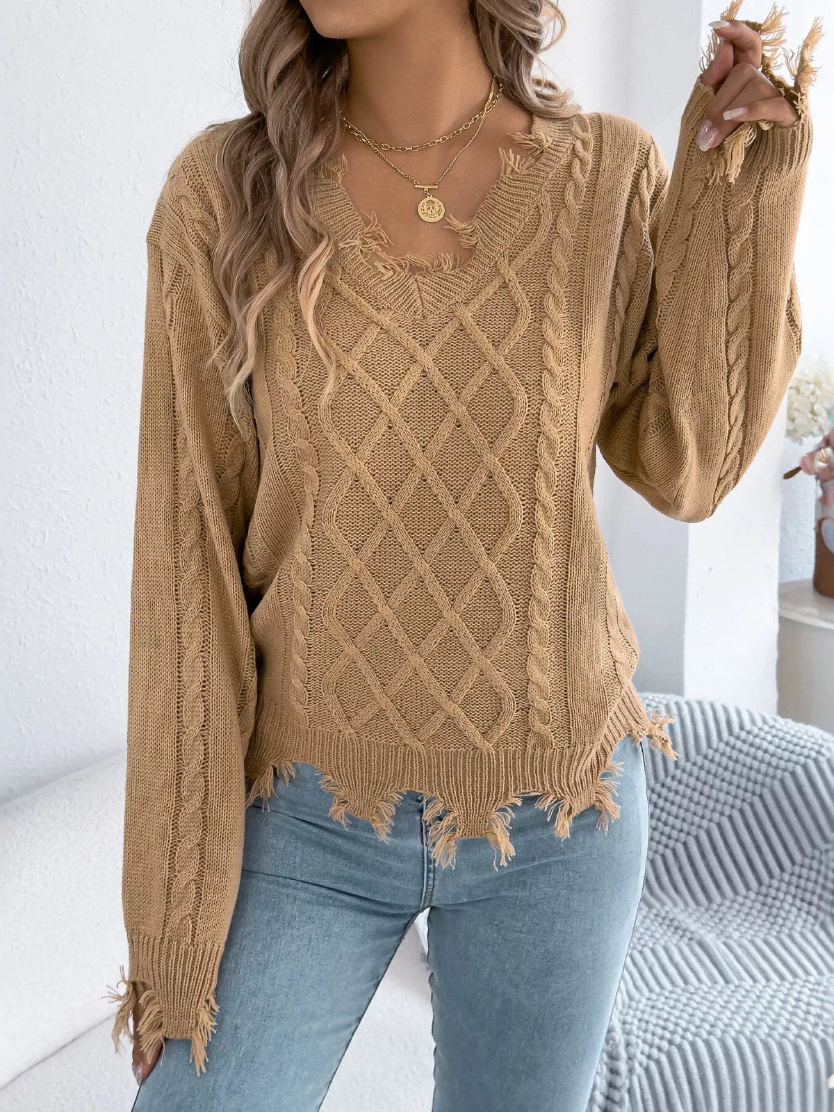 V-Neck Distressed Hem Cable Knit Sweater