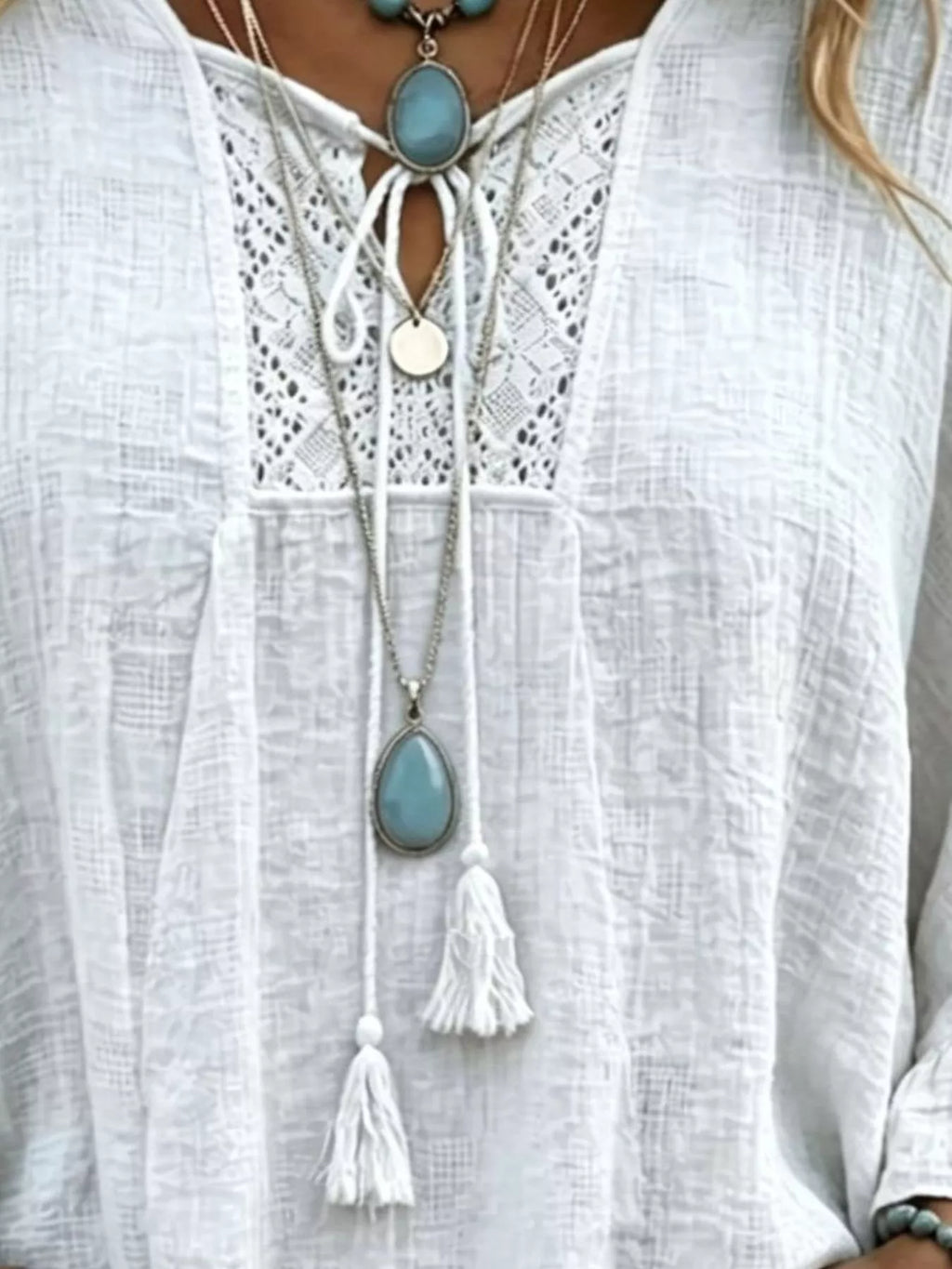 Full Size Tassel Tie Neck Ruffled Hem Blouse Plus Size - Lilixa.store