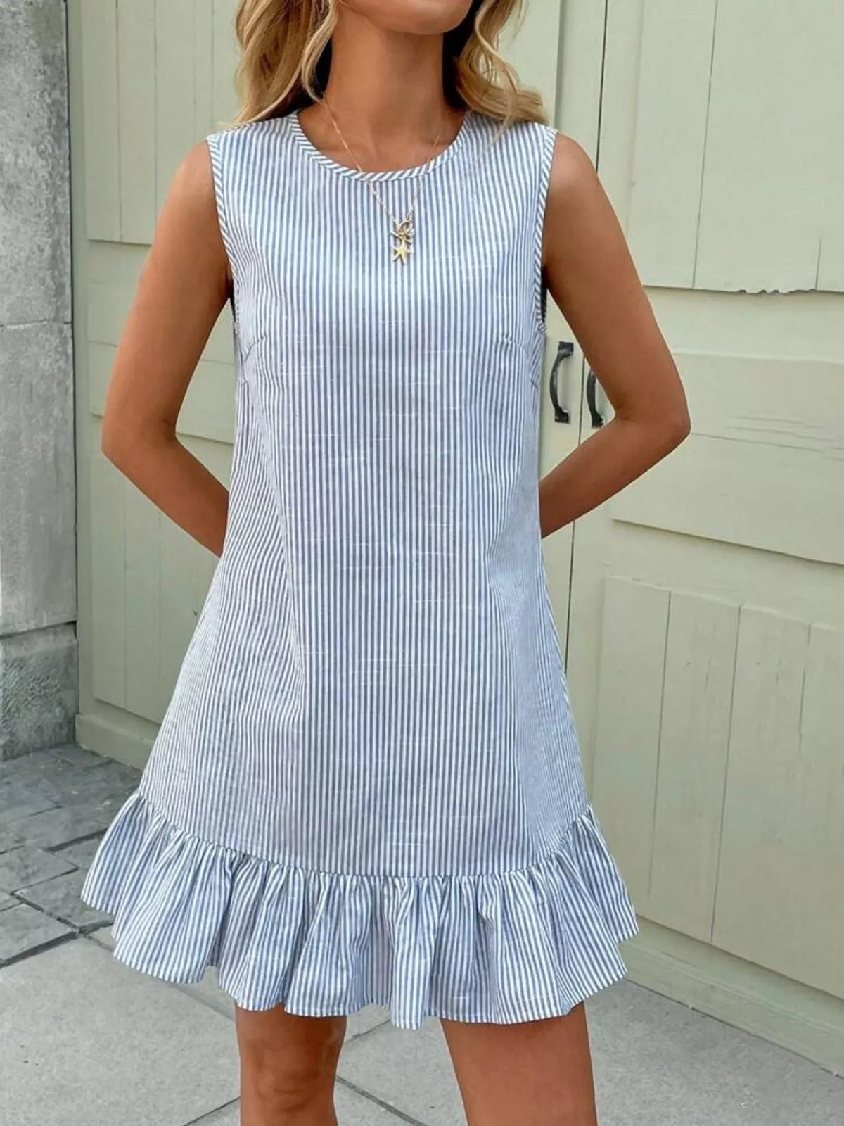 Sleeveless Striped Ruffle Hem Mini Dress in Sky Blue