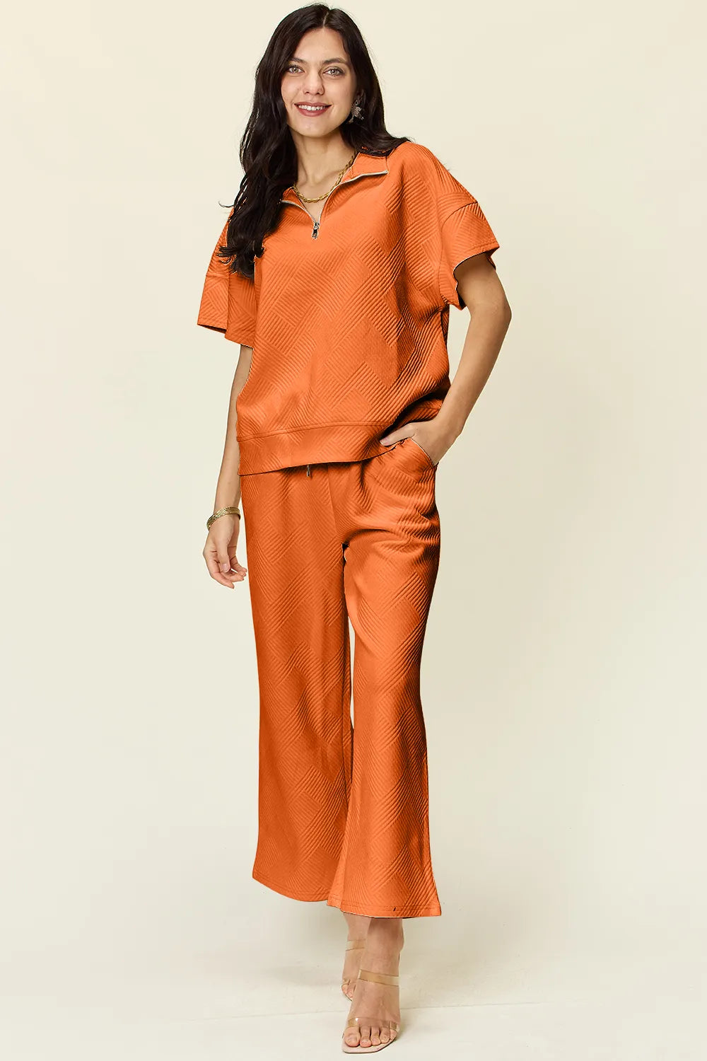 Double Take Full Size Texture Half Zip Short Sleeve Top and Pants Set in Tangerine