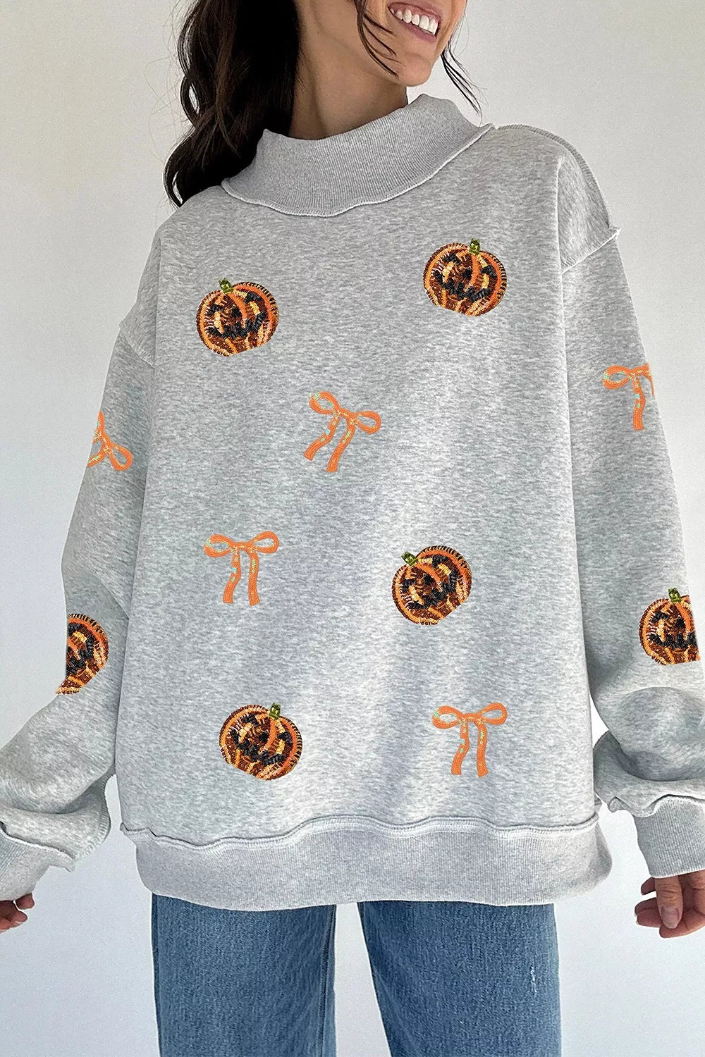 Sequin Pumpkin Face Bow Exposed Seam Halloween Sweatshirt - Lilixa.store
