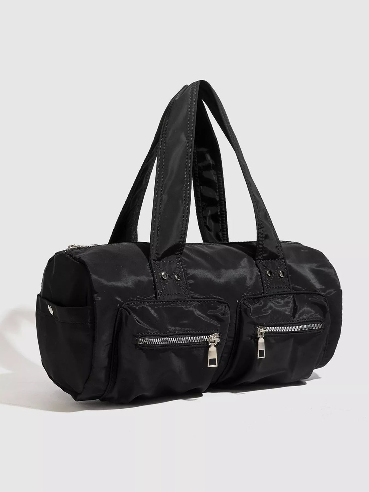 Minimalist Nylon Barrel Shoulder Bag with Multi-Pocket Utility in Black