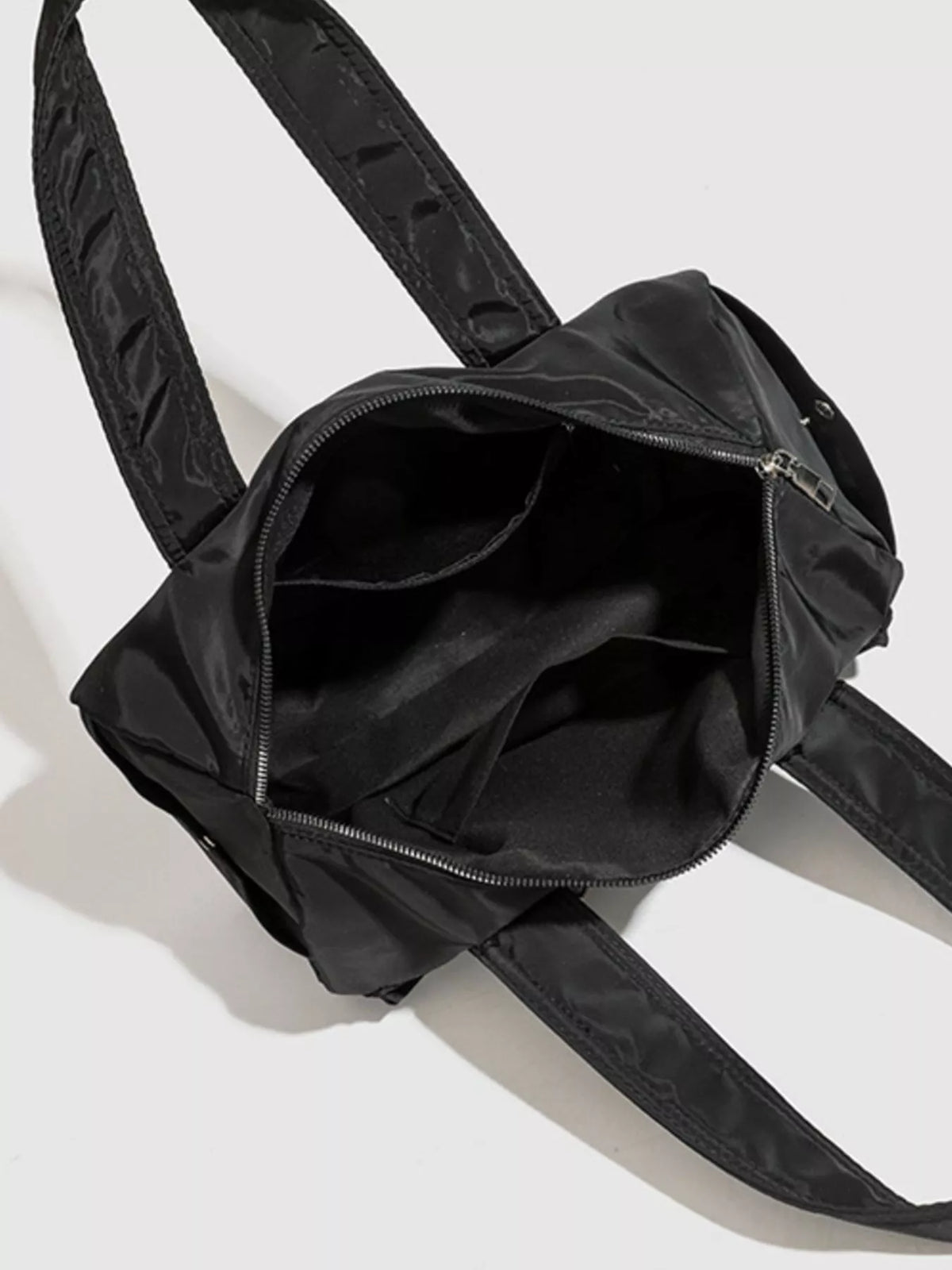 Minimalist Nylon Barrel Shoulder Bag with Multi-Pocket Utility in Black, view 6