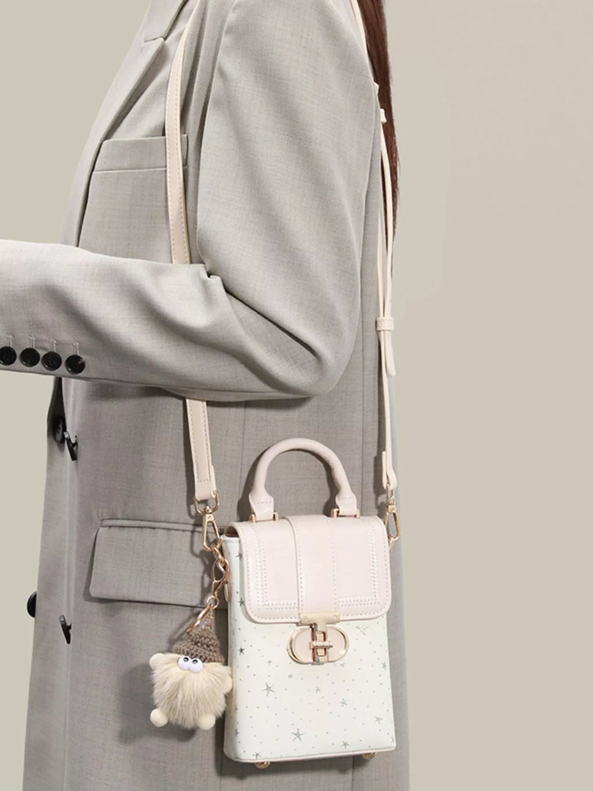 Star-Patterned Mini Crossbody Bag with Plush Charm in White