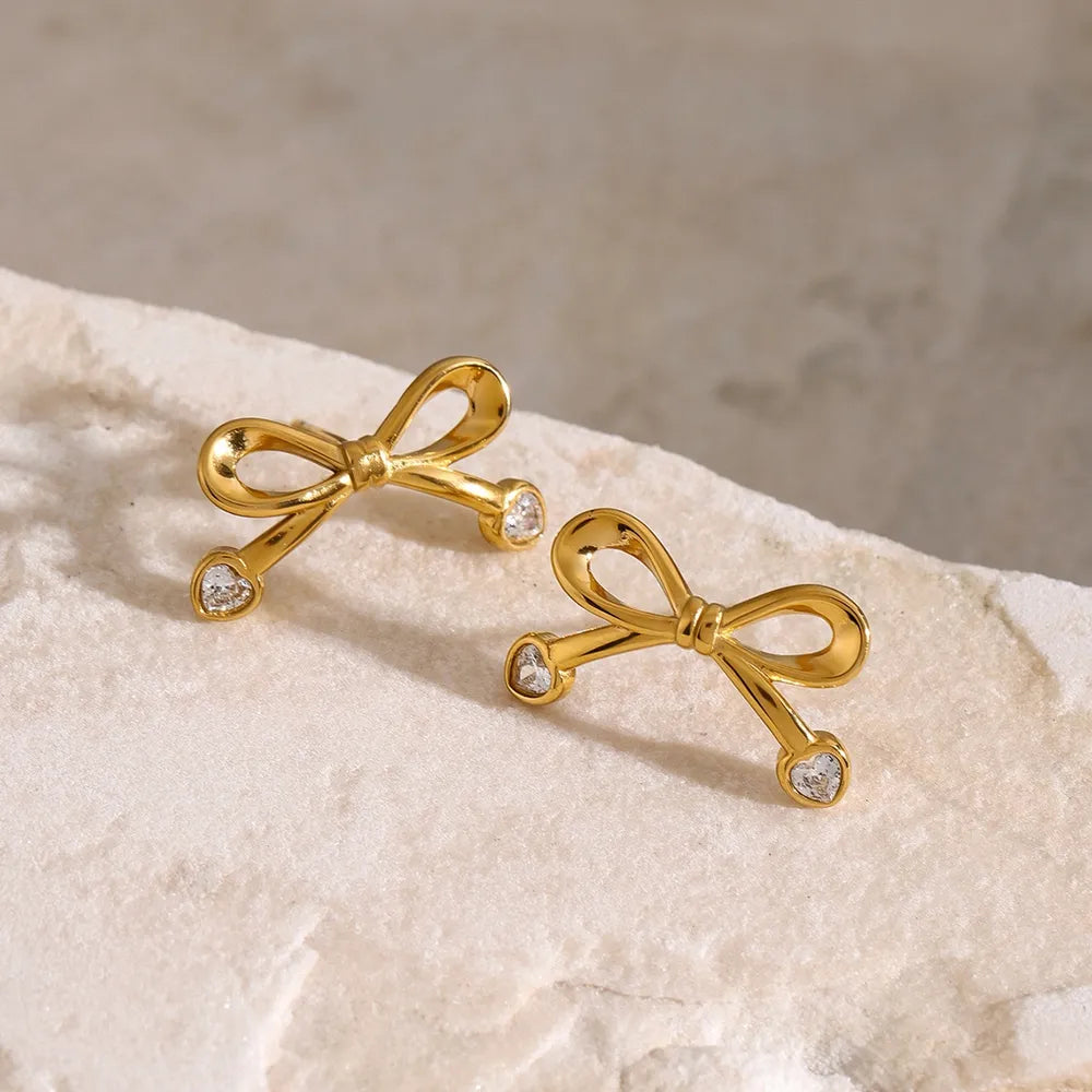 Stainless Steel Inlaid Zircon Bow Earrings in Gold, view 4