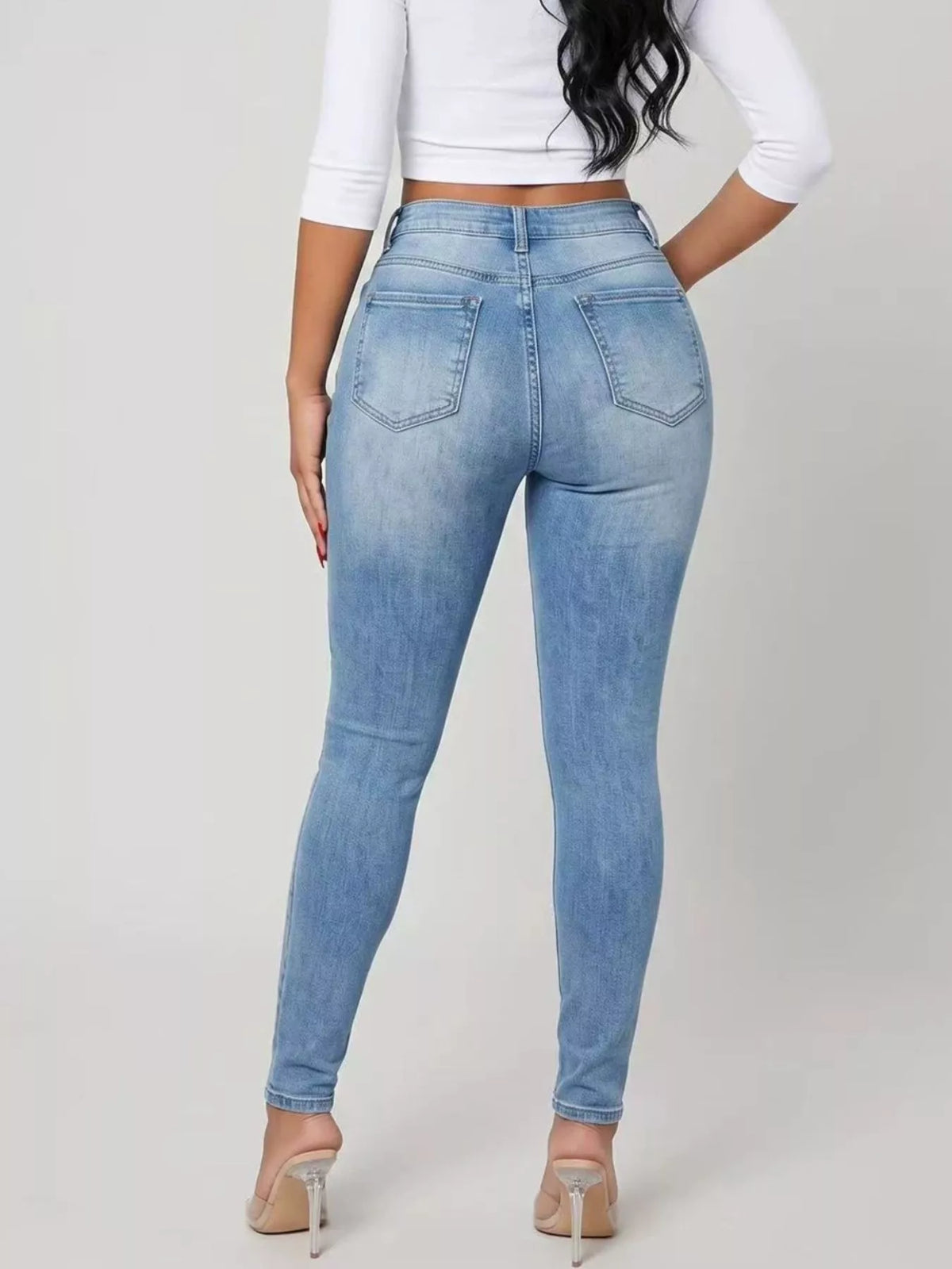 High-Waisted Distressed Skinny Jeans