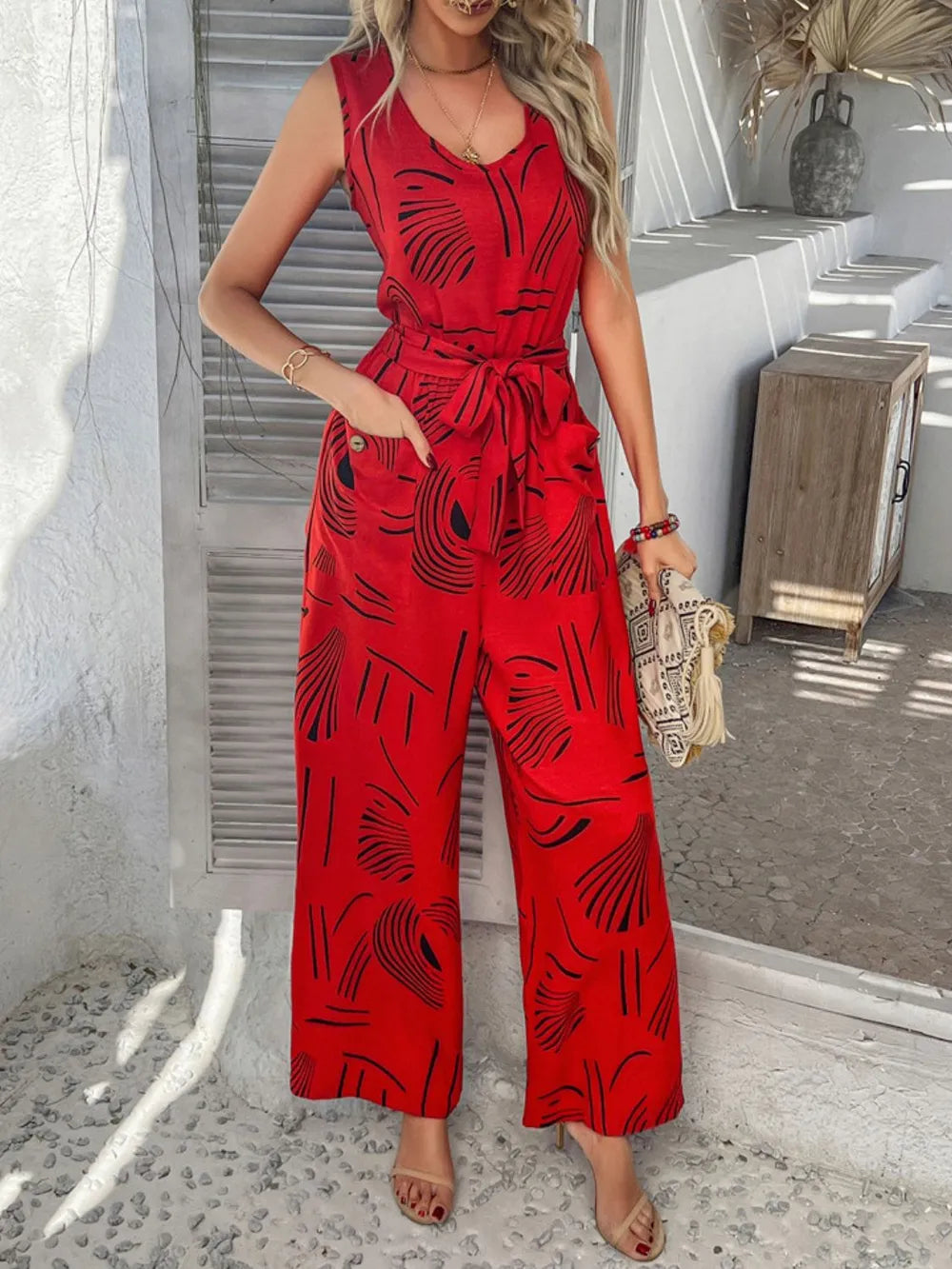 Devine Printed Round Neck Sleeveless Tie Waist Jumpsuit - Lilixa.store