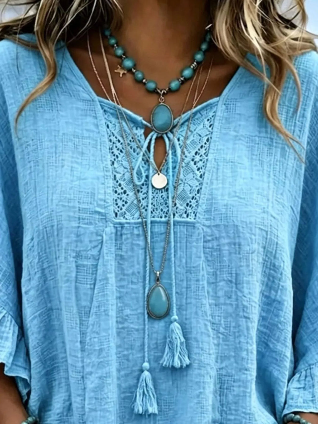 Full Size Tassel Tie Neck Ruffled Hem Blouse Plus Size - Lilixa.store
