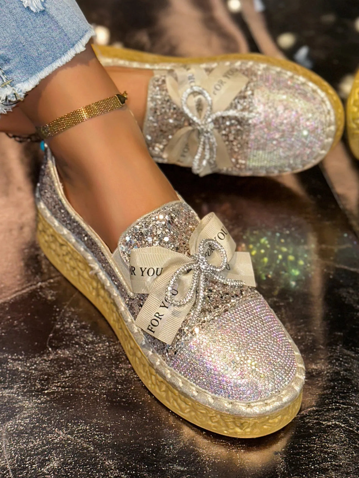 Rhinestone Bow Round Toe Slip-Ons in Gold