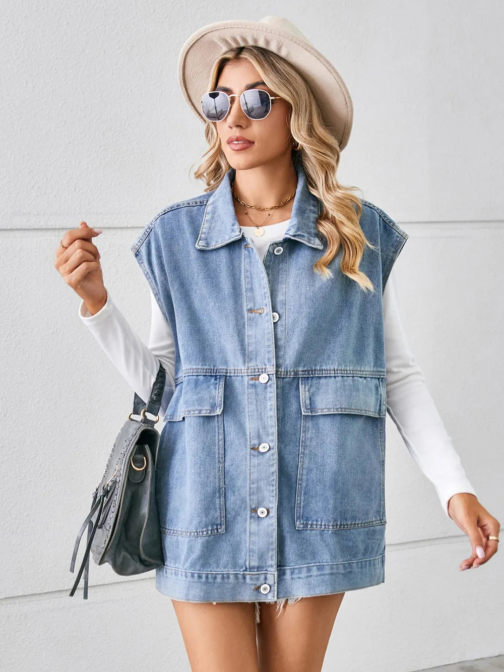 Pocketed Button Up Sleeveless Denim Jacket in Light Blue