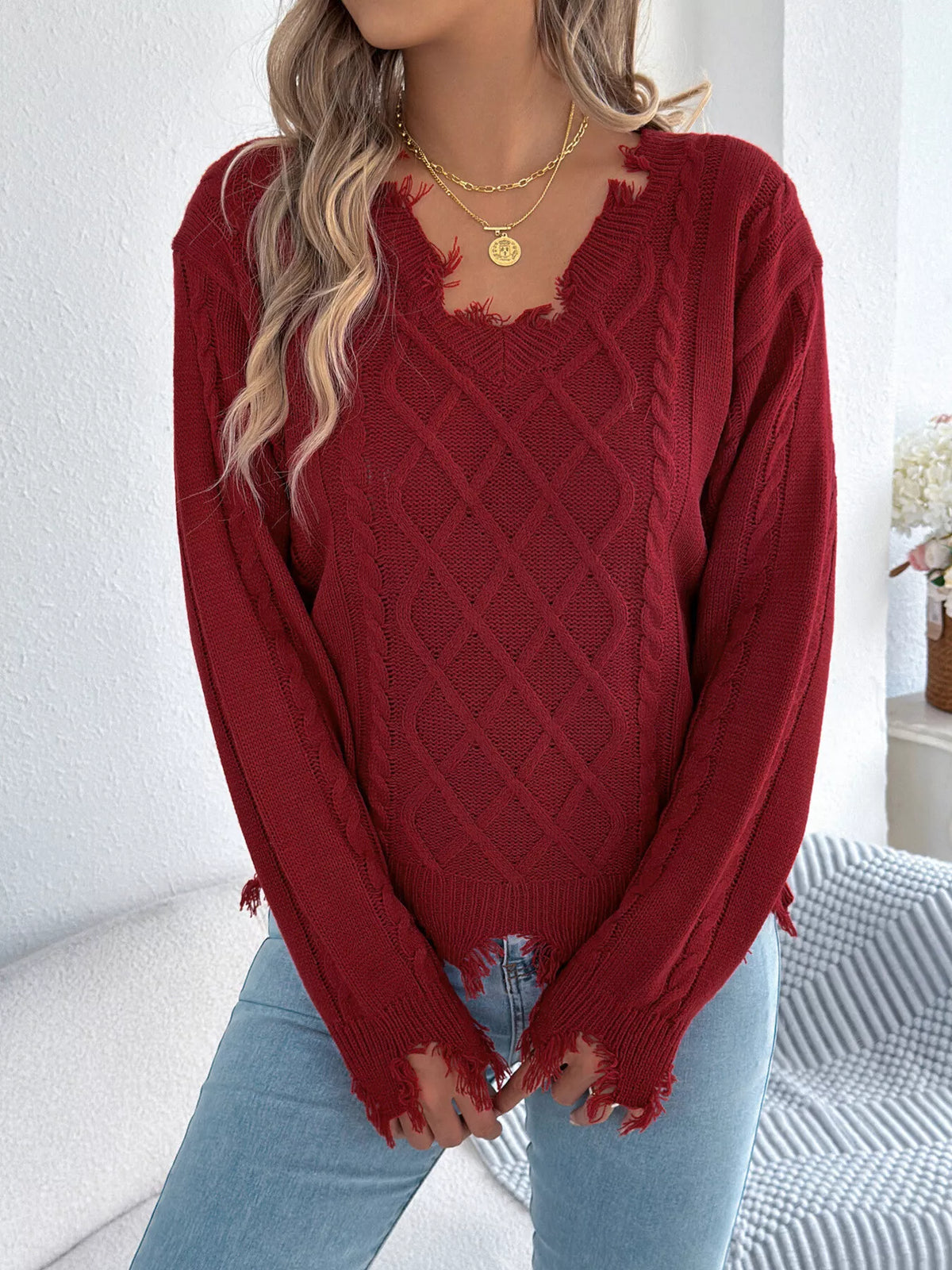 V-Neck Distressed Hem Cable Knit Sweater