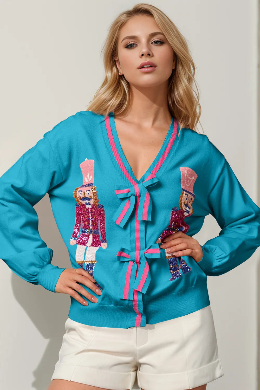 Double Take Full Size Nutcracker Sequin Bow Decor Cardigan - Lilixa.store