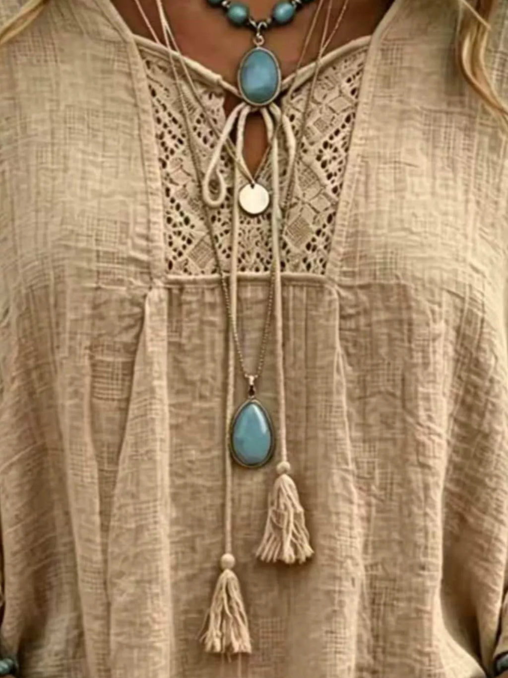 Full Size Tassel Tie Neck Ruffled Hem Blouse Plus Size - Lilixa.store