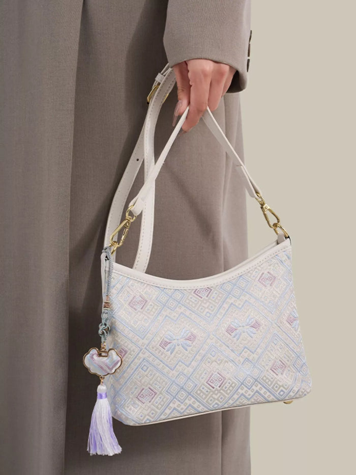 Geometric Pattern Jacquard Crossbody Bag with Tassel Charm in White
