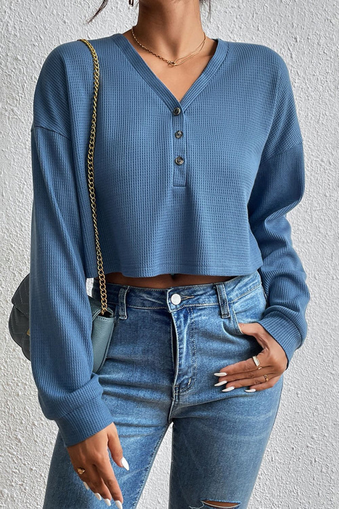 Ivy Lane Cropped V-Neck Raglan Sleeve Buttoned Blouse in Dusty Blue