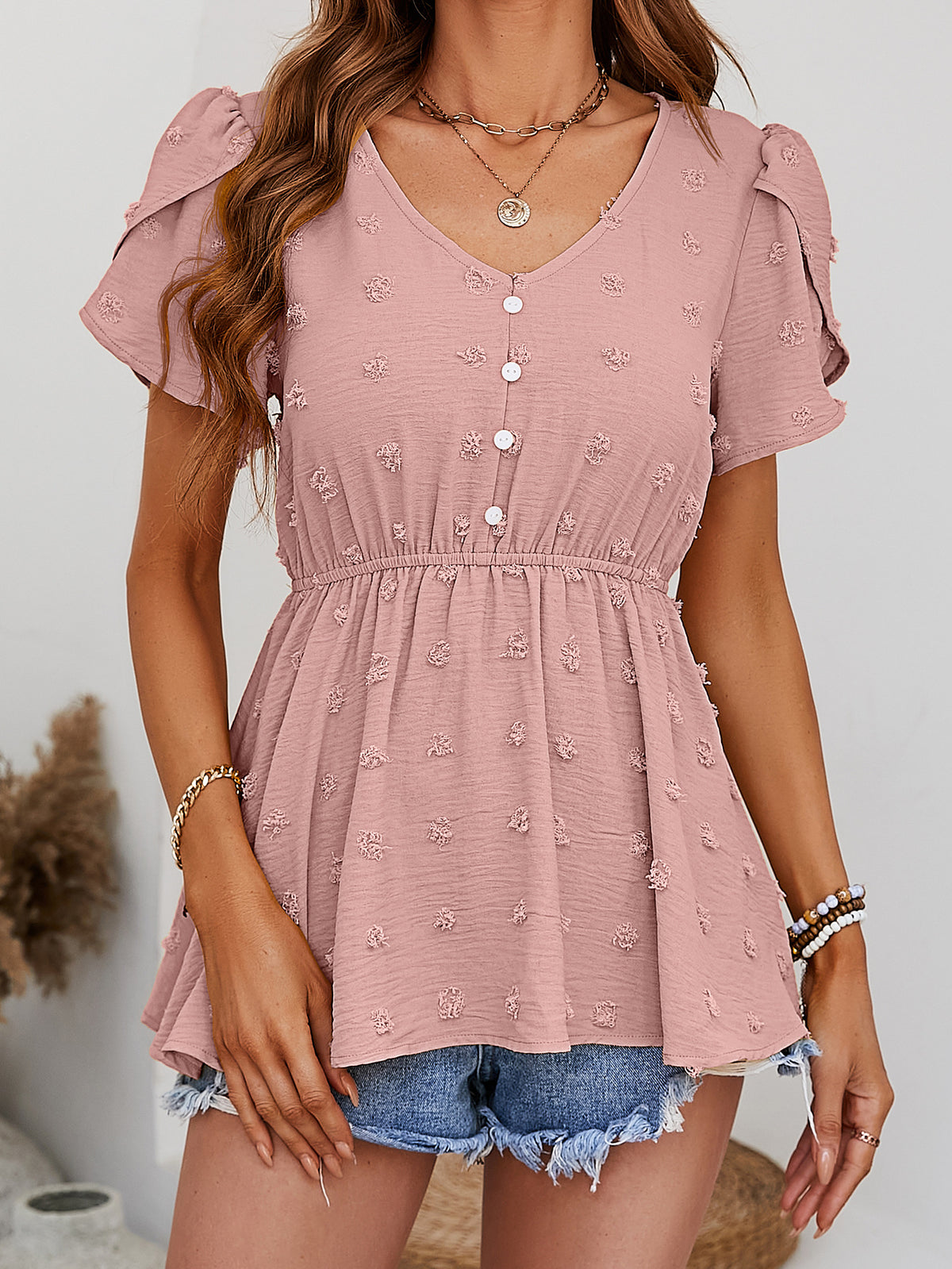 Swiss Dot Buttoned Petal Sleeve Peplum Blouse in Dusty Pink