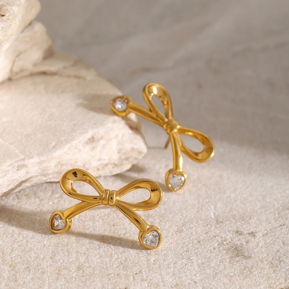 Stainless Steel Inlaid Zircon Bow Earrings in Gold, view 5
