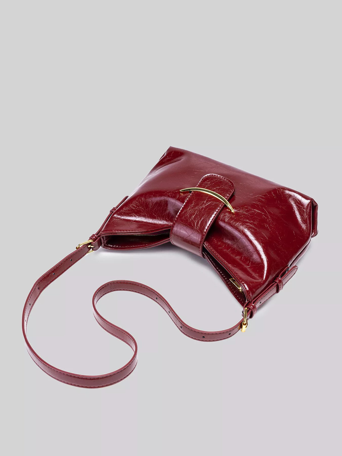 Elegant Glossy Patent Leather Shoulder Bag with Crescent Gold Accent in Wine Red, view 8