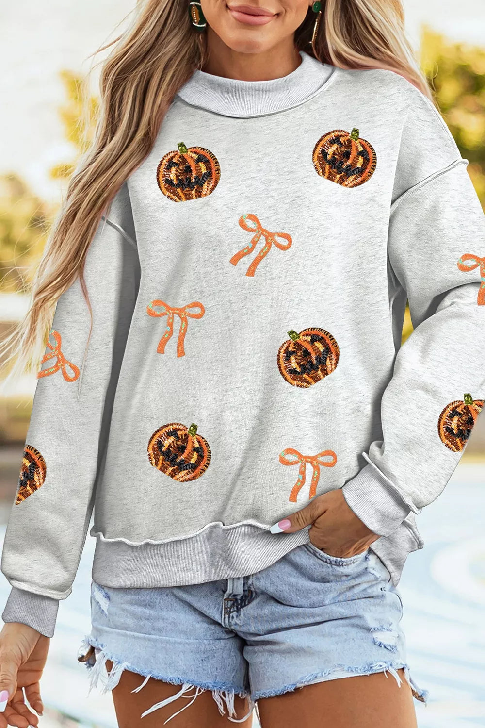 Sequin Pumpkin Face Bow Exposed Seam Halloween Sweatshirt - Lilixa.store