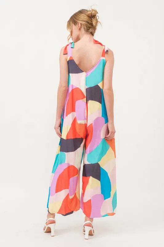 And The Why Tied Shoulder Straps Wide-Leg Geo Print Jumpsuit - Lilixa.store