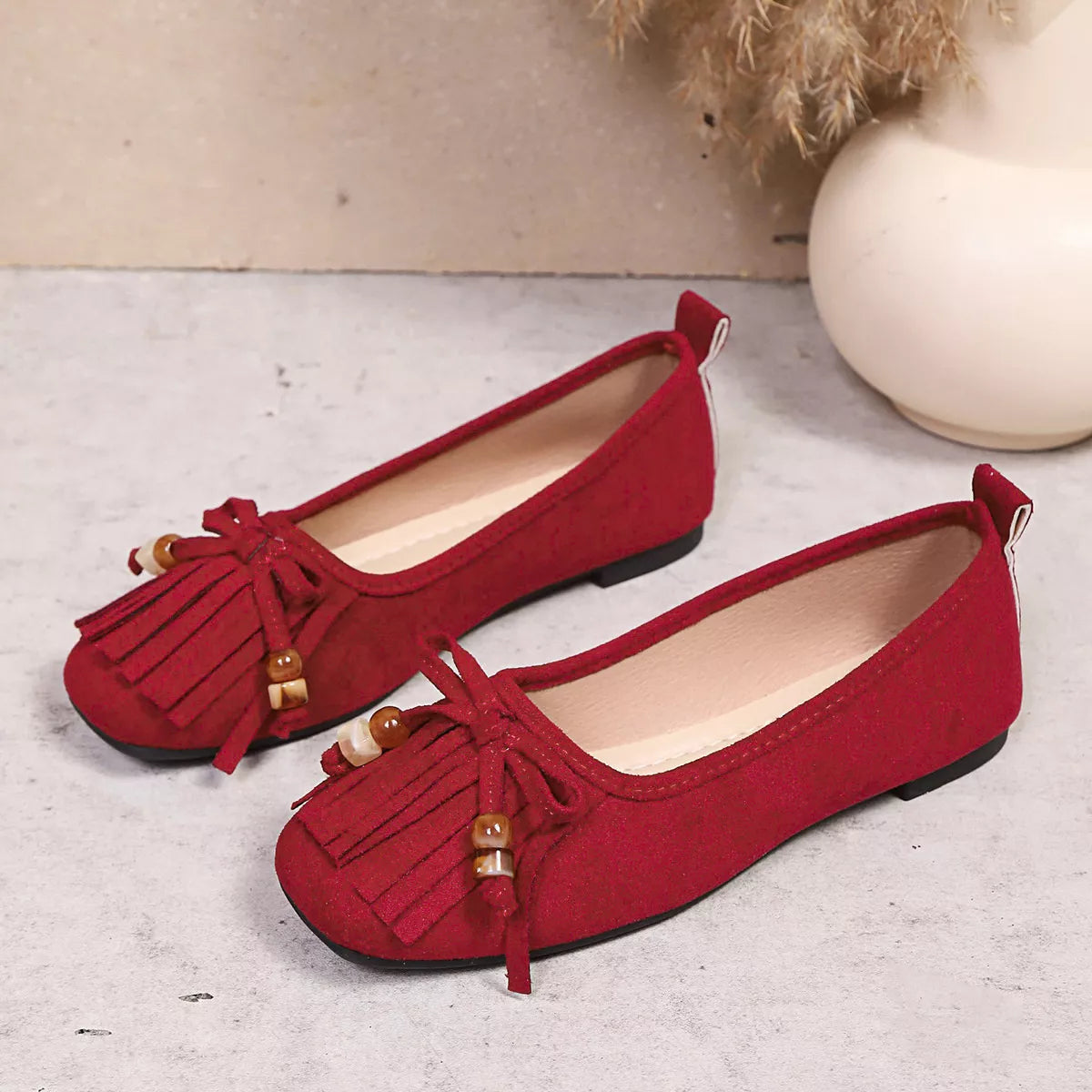 Suede Fringe Slip-Ons in Red
