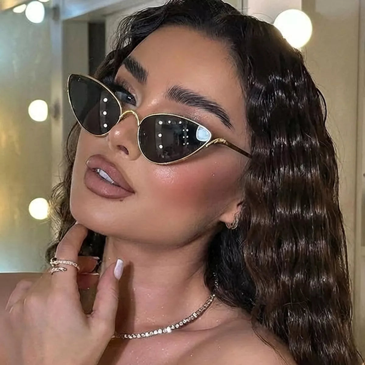 Gold-Rimmed Cat-Eye Sunglasses in Black