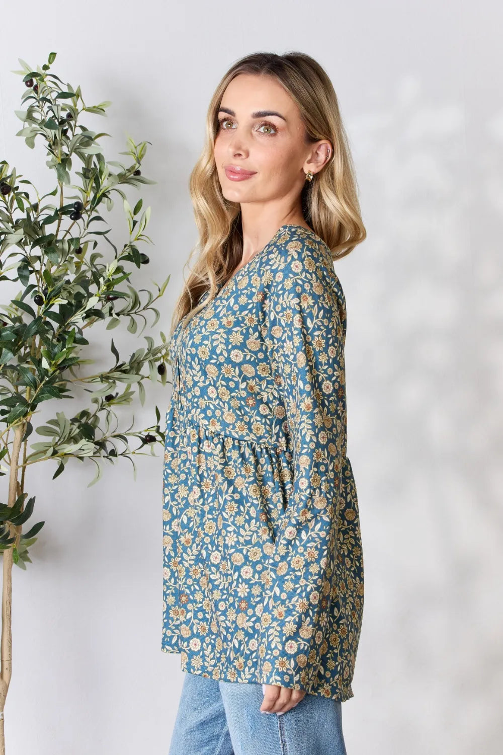 Heimish Full Size Floral Half Button Long Sleeve Blouse - Lilixa.store
