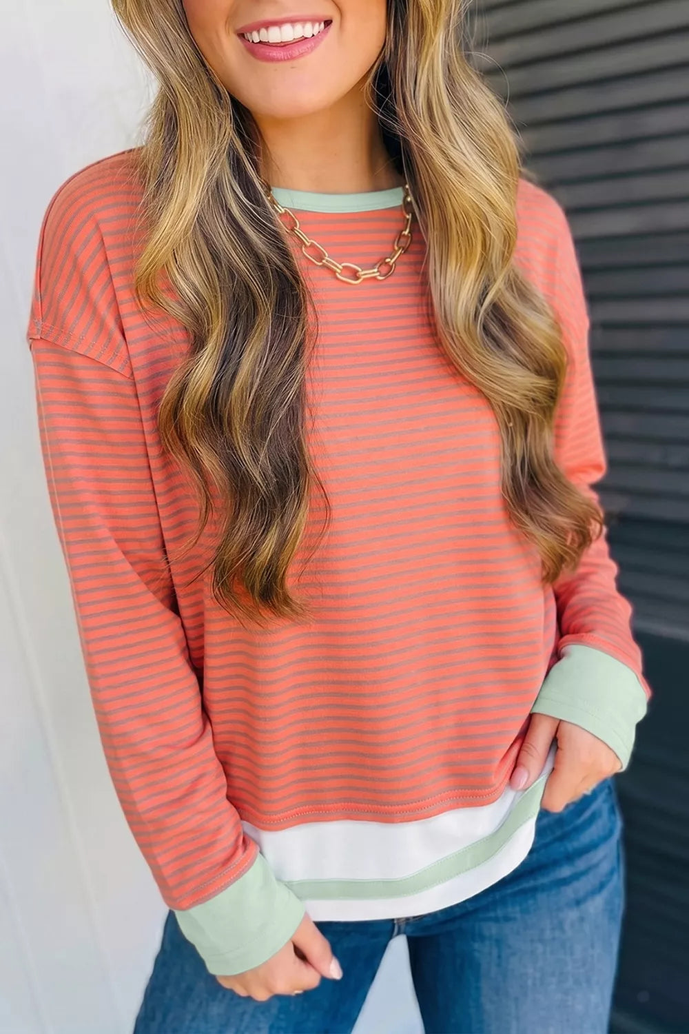 Stripe Colorblock Detail Raw Seam Long Sleeve Tunic Top in Burnt Coral