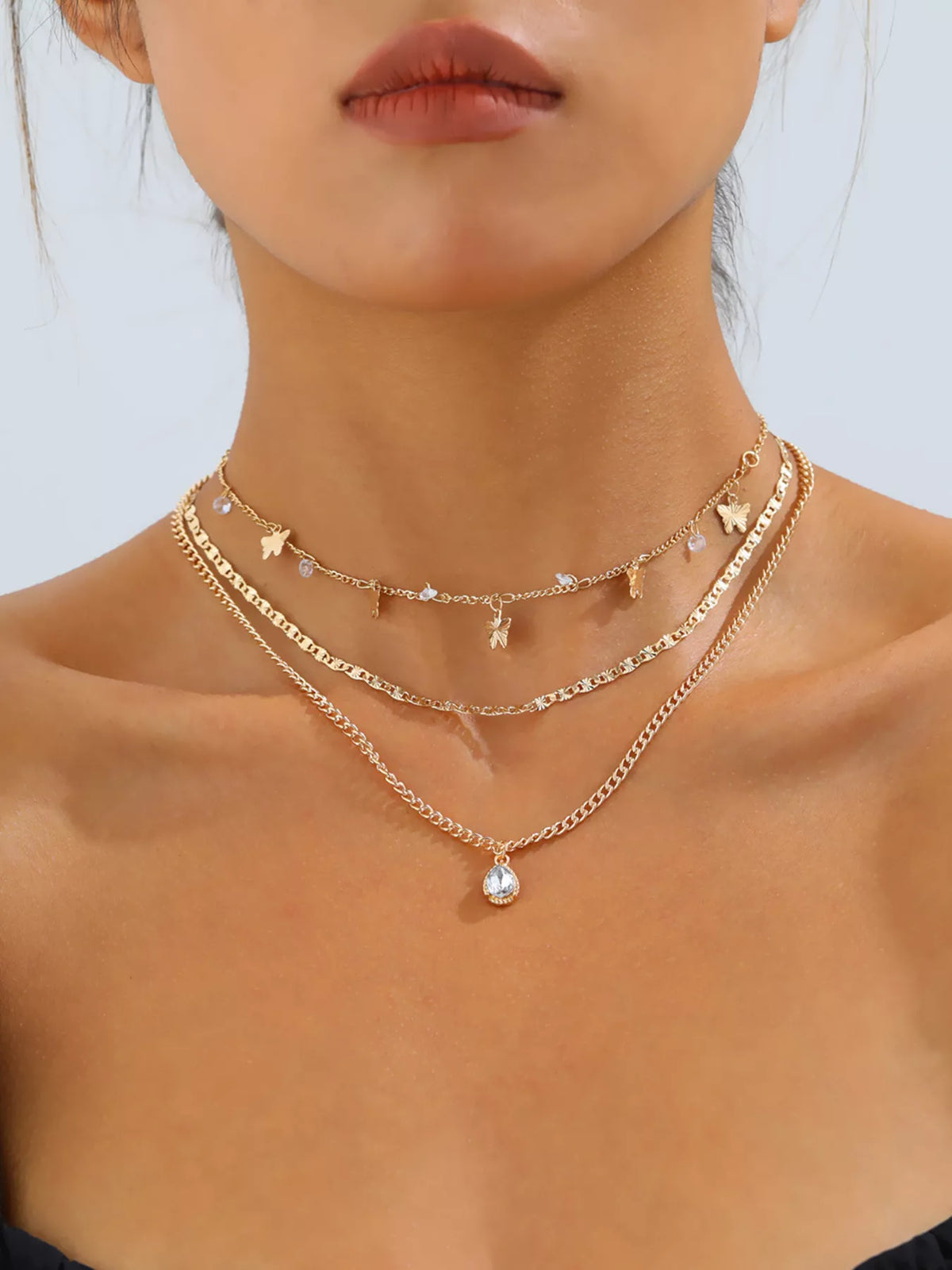 Layered Alloy Necklace with Butterfly and Zircon Charms