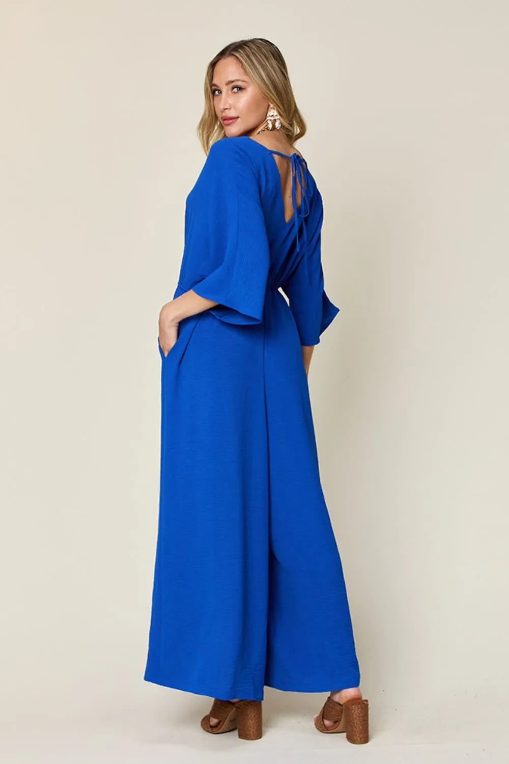 Double Take Full Size Surplice Wide Leg Jumpsuit with Pockets - Lilixa.store