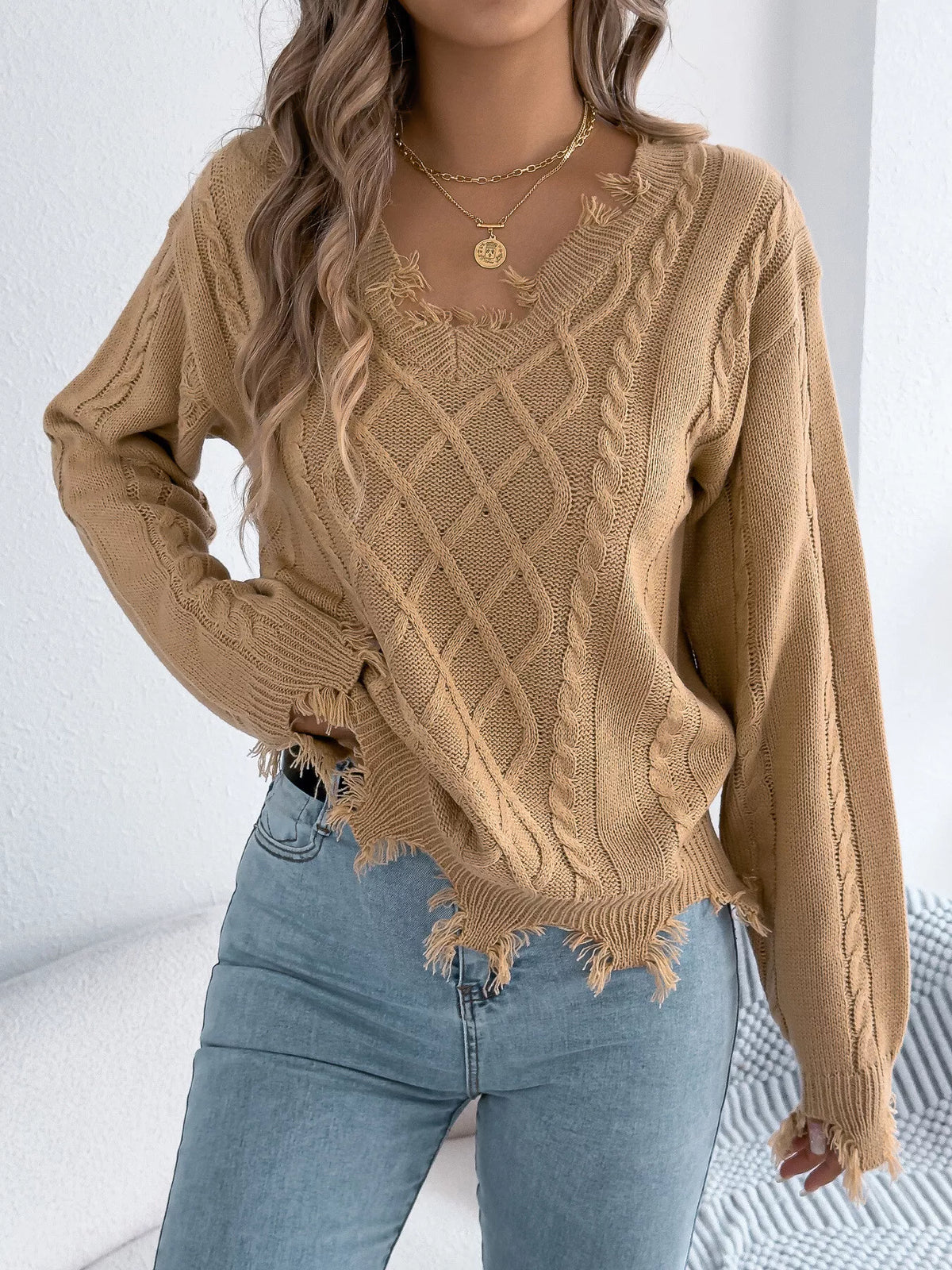 V-Neck Distressed Hem Cable Knit Sweater