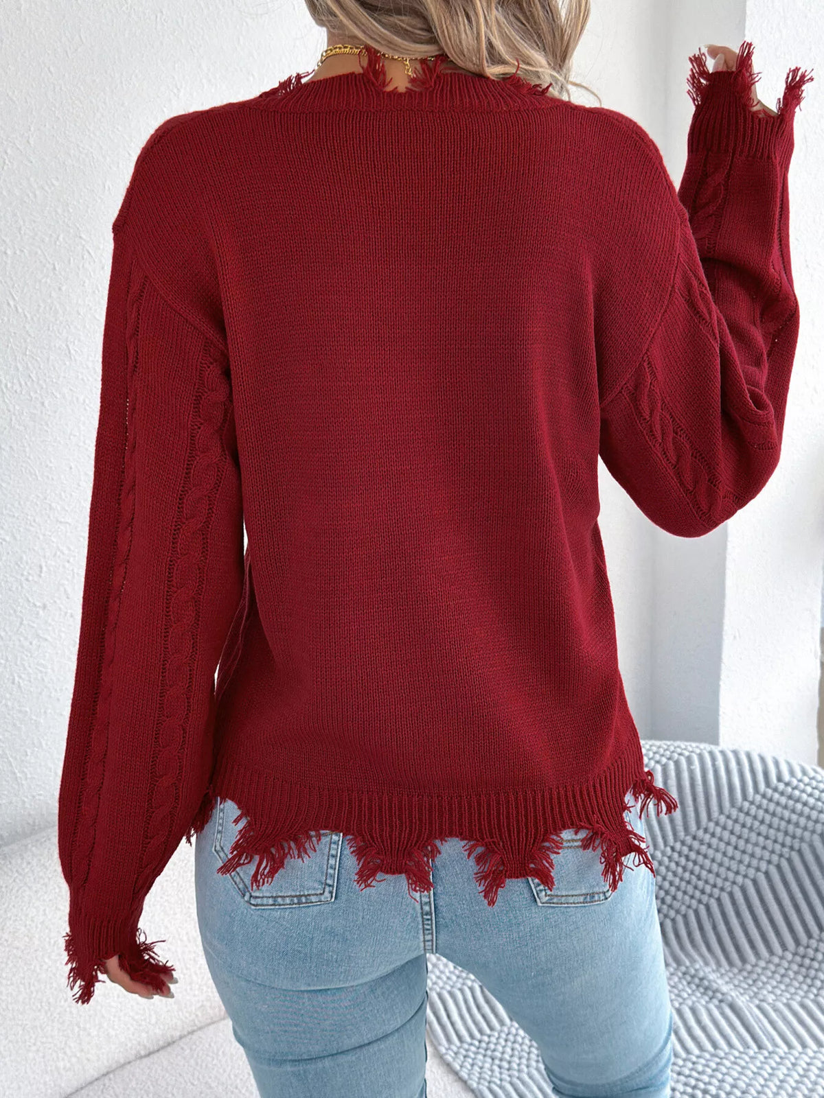 V-Neck Distressed Hem Cable Knit Sweater