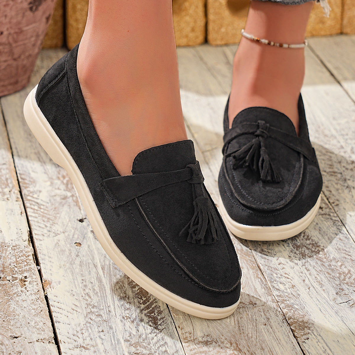 Tassel Round Toe Slip-Ons in Black