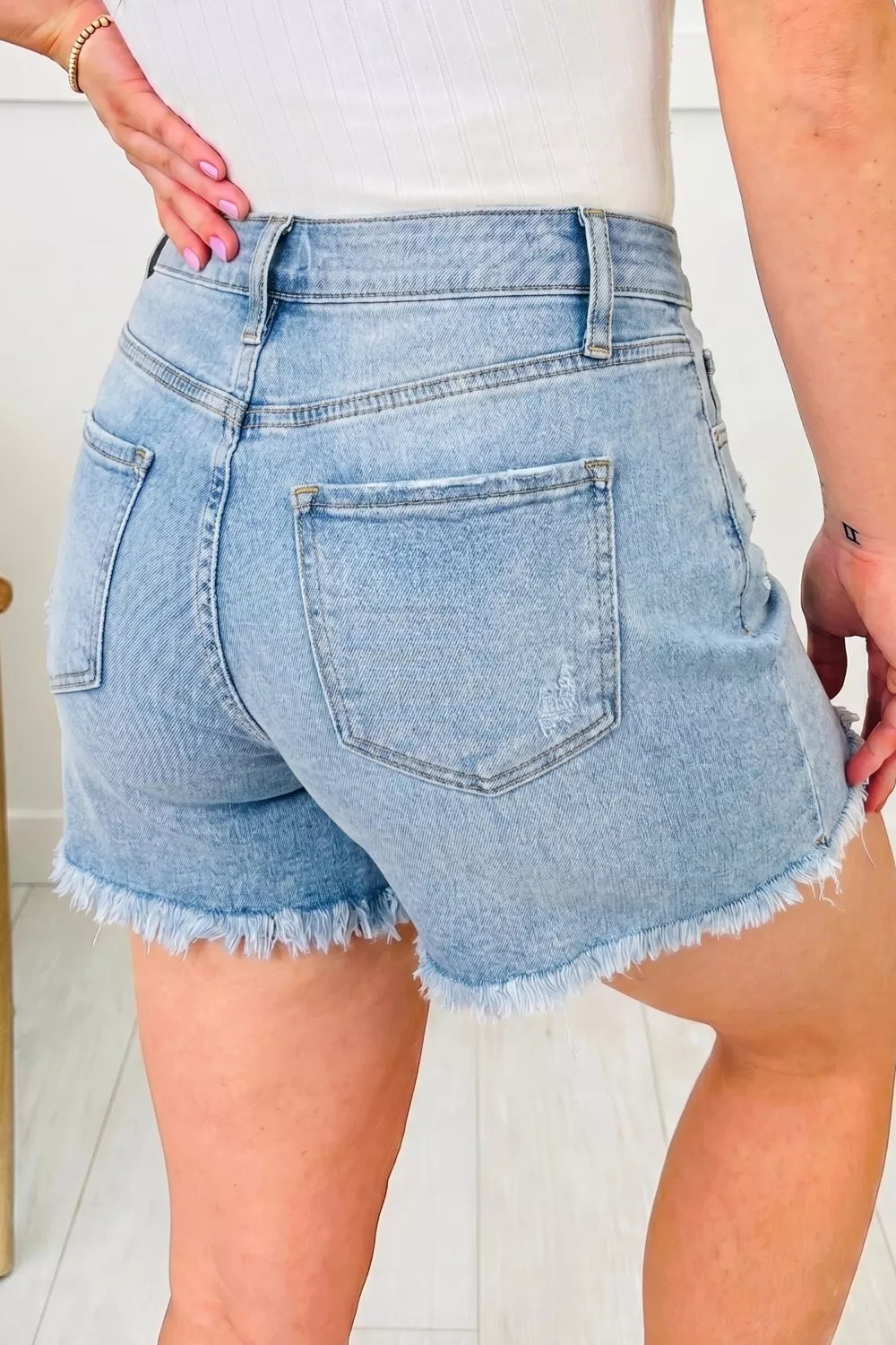 Asymmetric Raw Hem Distressed Whiskery Denim Shorts, view 5